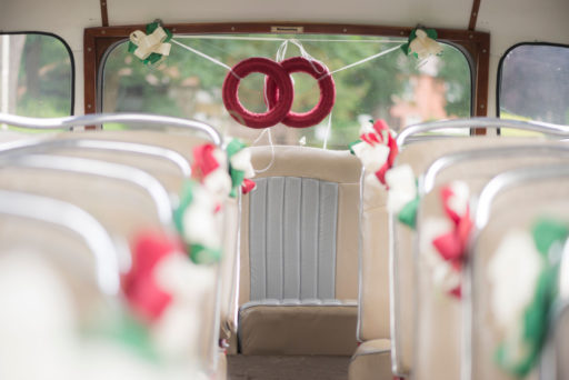 repurposed bus decorated with wedding decorations and used for wedding transportation